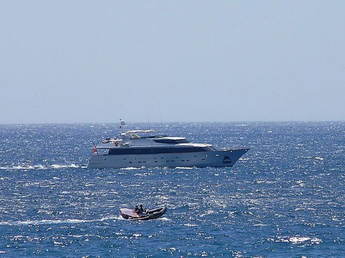 a boat in the water aboard PROVIDENCE Yacht for Sale