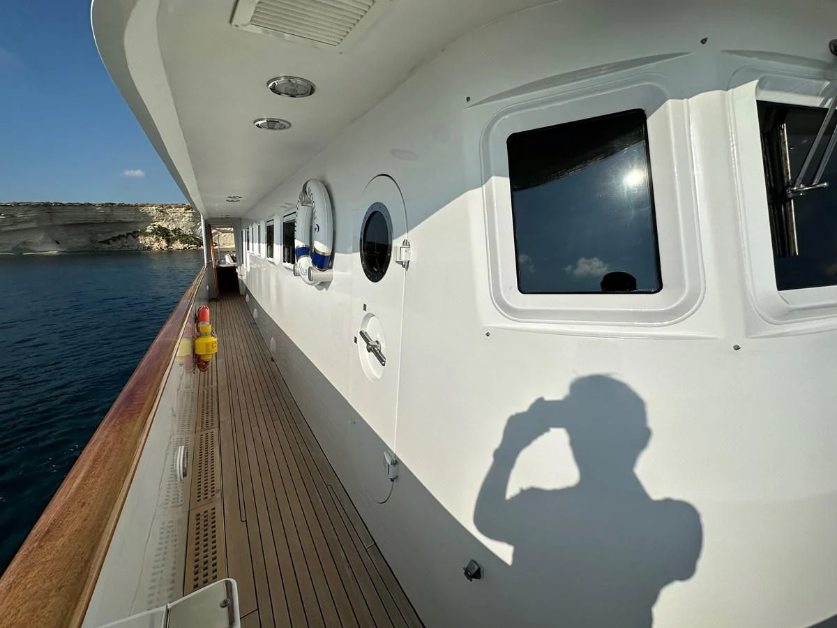 a boat with a window aboard CHEETAH MOON Yacht for Sale