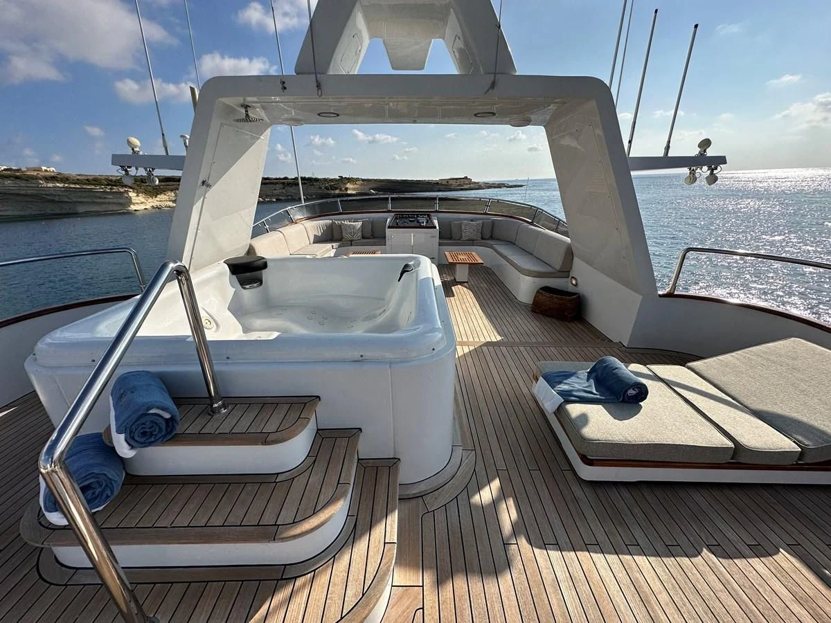 a boat on a deck aboard CHEETAH MOON Yacht for Sale