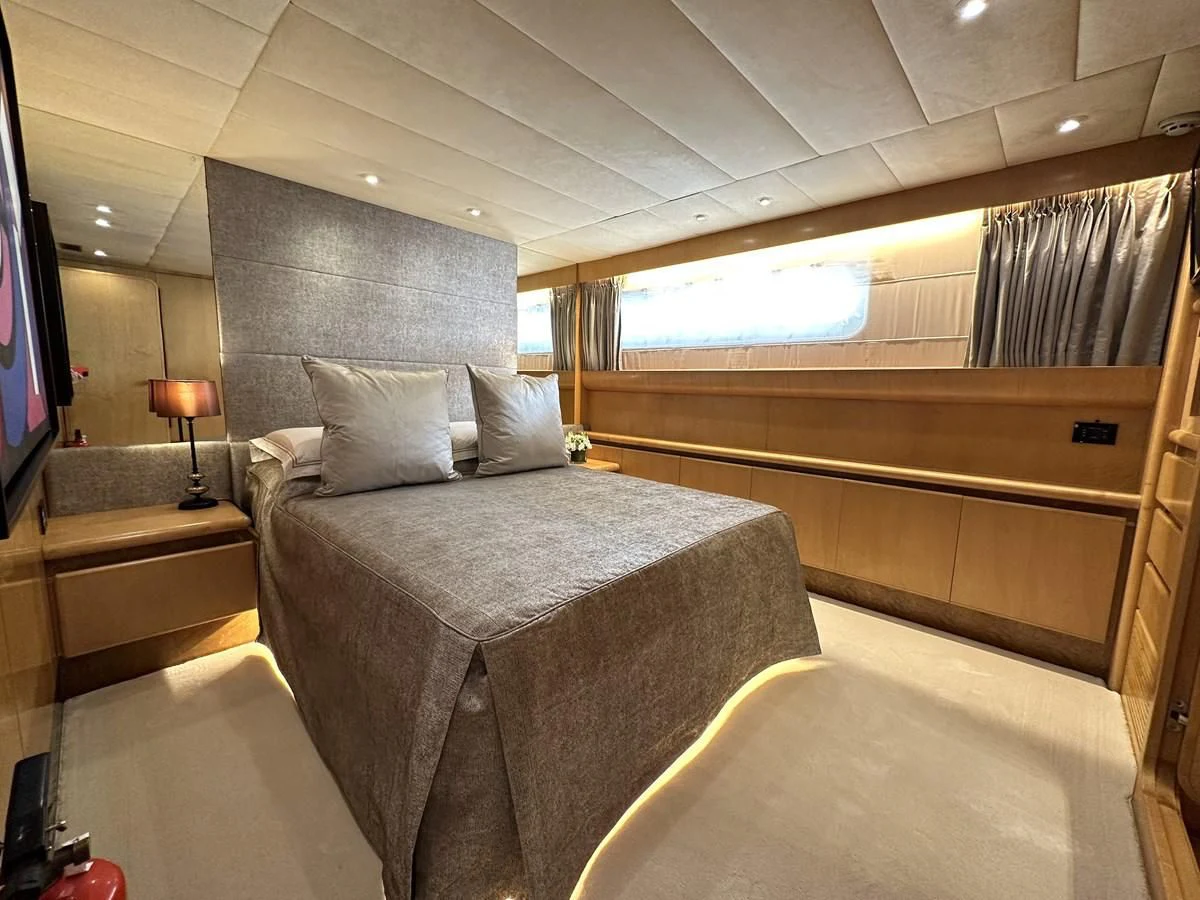 a bed in a room aboard CHEETAH MOON Yacht for Sale