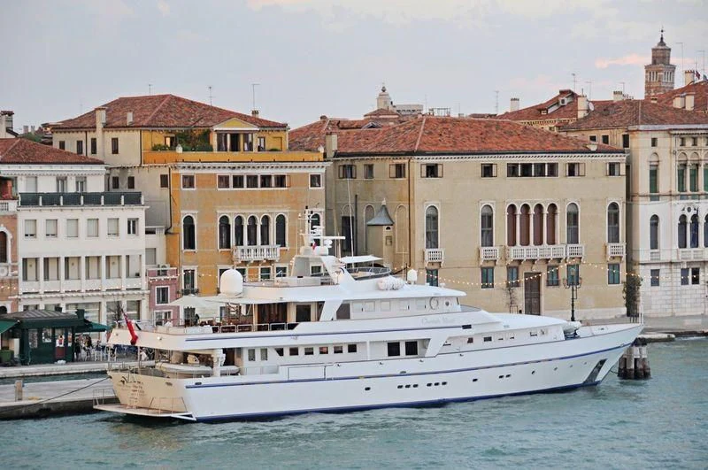 a large white boat in the water aboard CHEETAH MOON Yacht for Sale