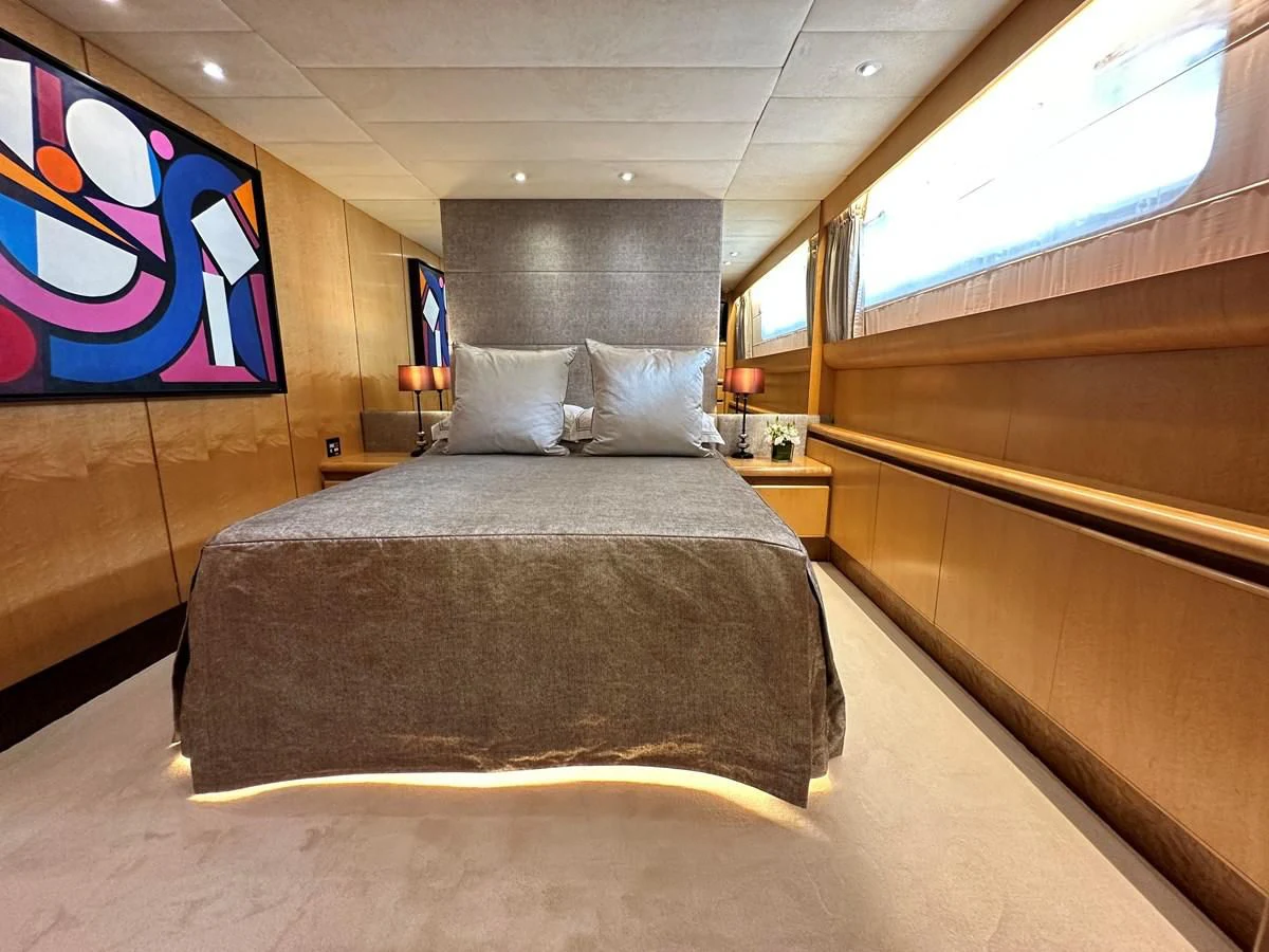 a bed in a room aboard CHEETAH MOON Yacht for Sale