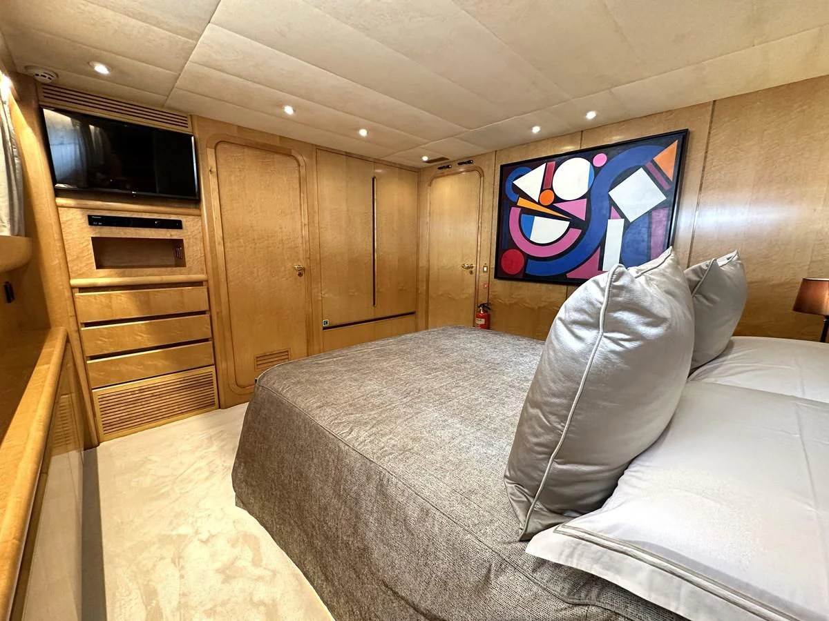 a bed in a room aboard CHEETAH MOON Yacht for Sale