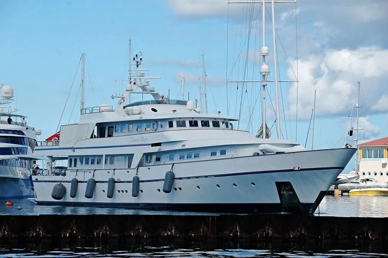 a large white boat aboard CHEETAH MOON Yacht for Sale