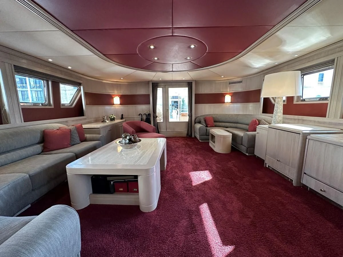 a room with a pink rug and a pink rug aboard CHEETAH MOON Yacht for Sale