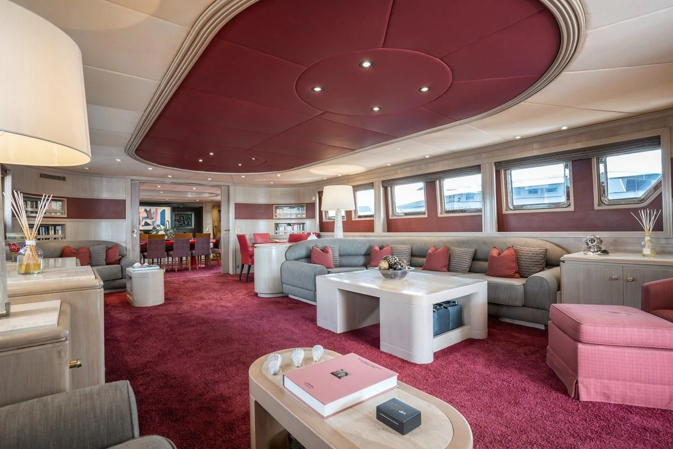 a living room with a pink carpet aboard CHEETAH MOON Yacht for Sale