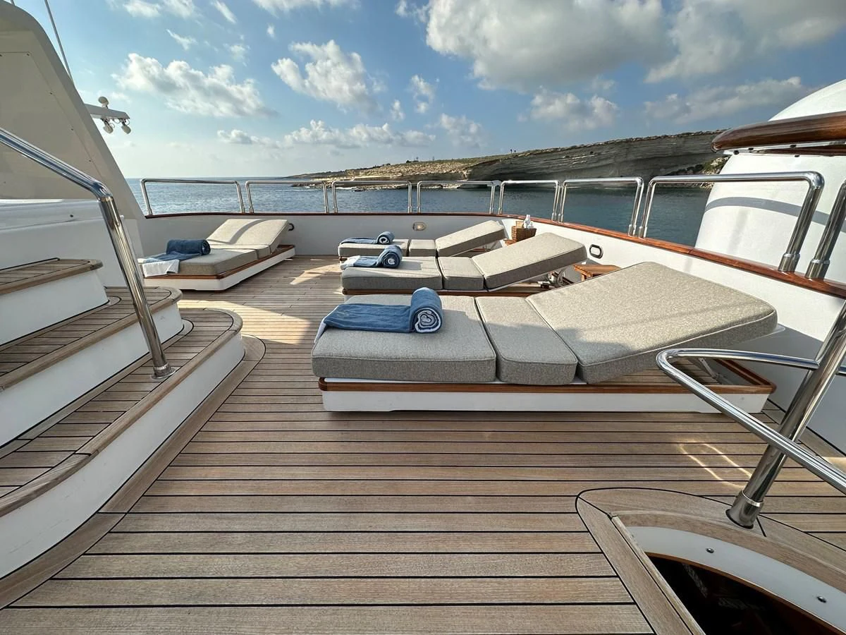a boat on a deck aboard CHEETAH MOON Yacht for Sale