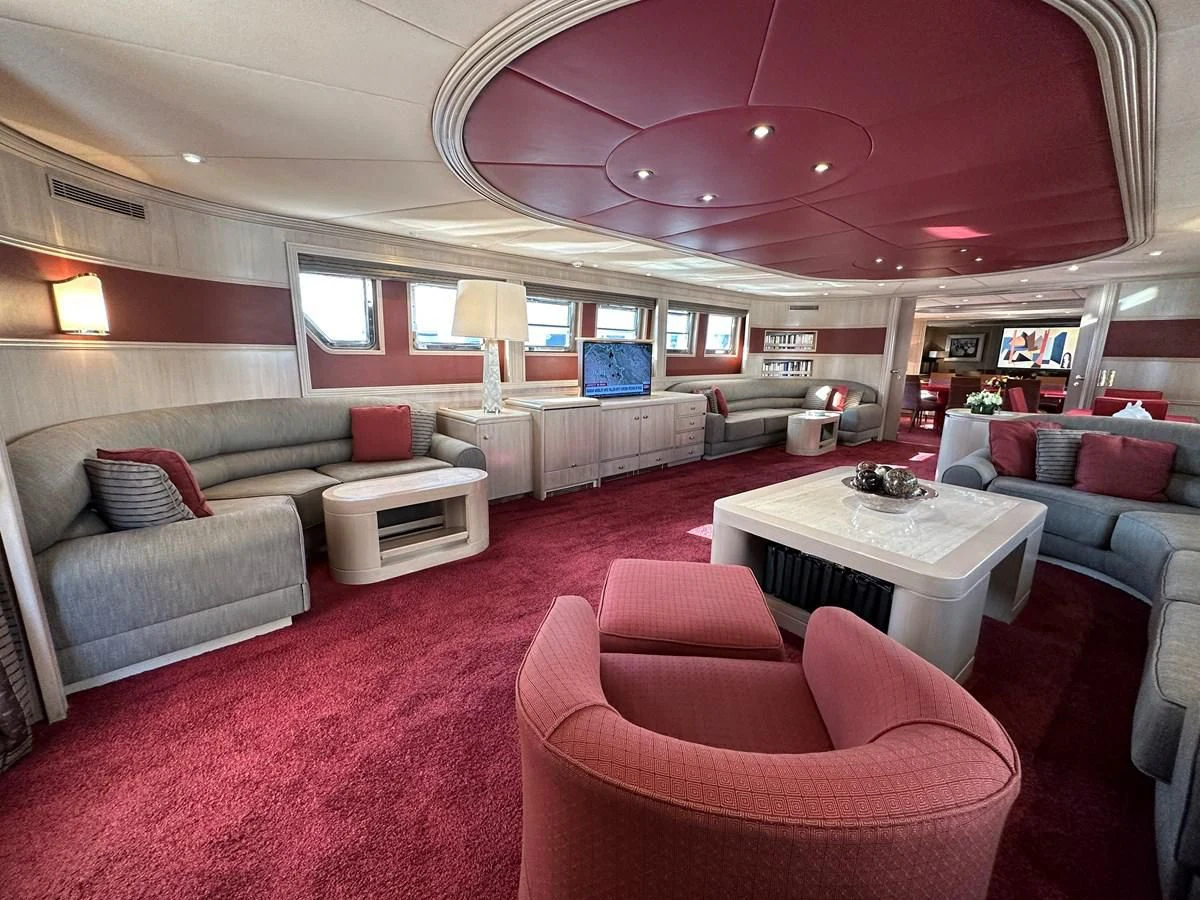 a room with a pink carpet and a pink carpet aboard CHEETAH MOON Yacht for Sale