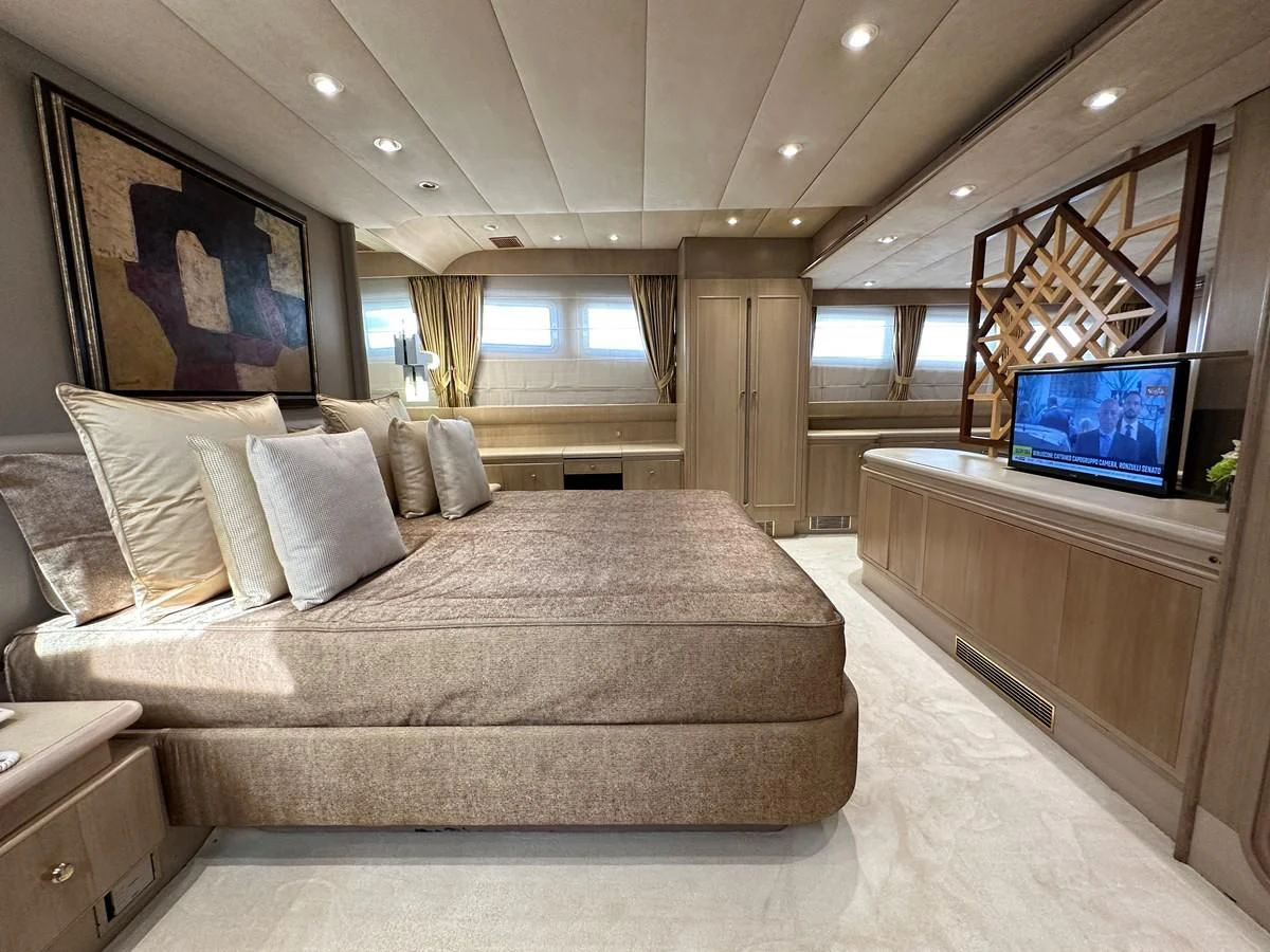 a large bed in a room aboard CHEETAH MOON Yacht for Sale