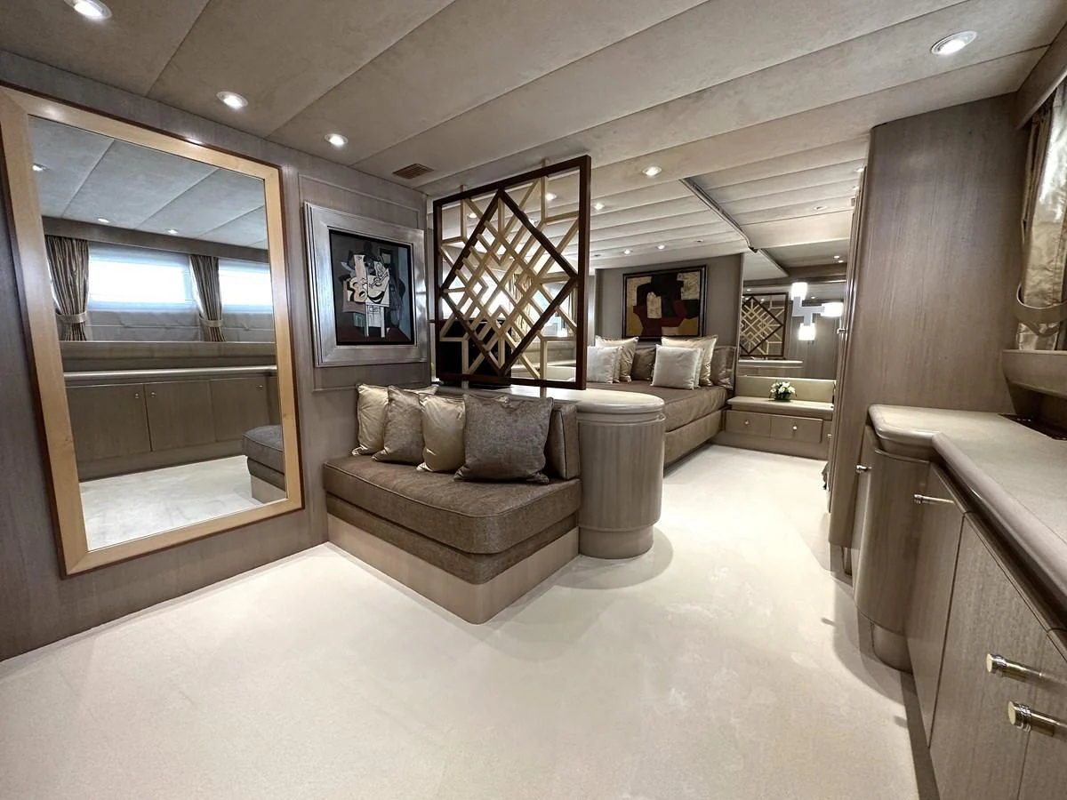 a living room with a large window aboard CHEETAH MOON Yacht for Sale