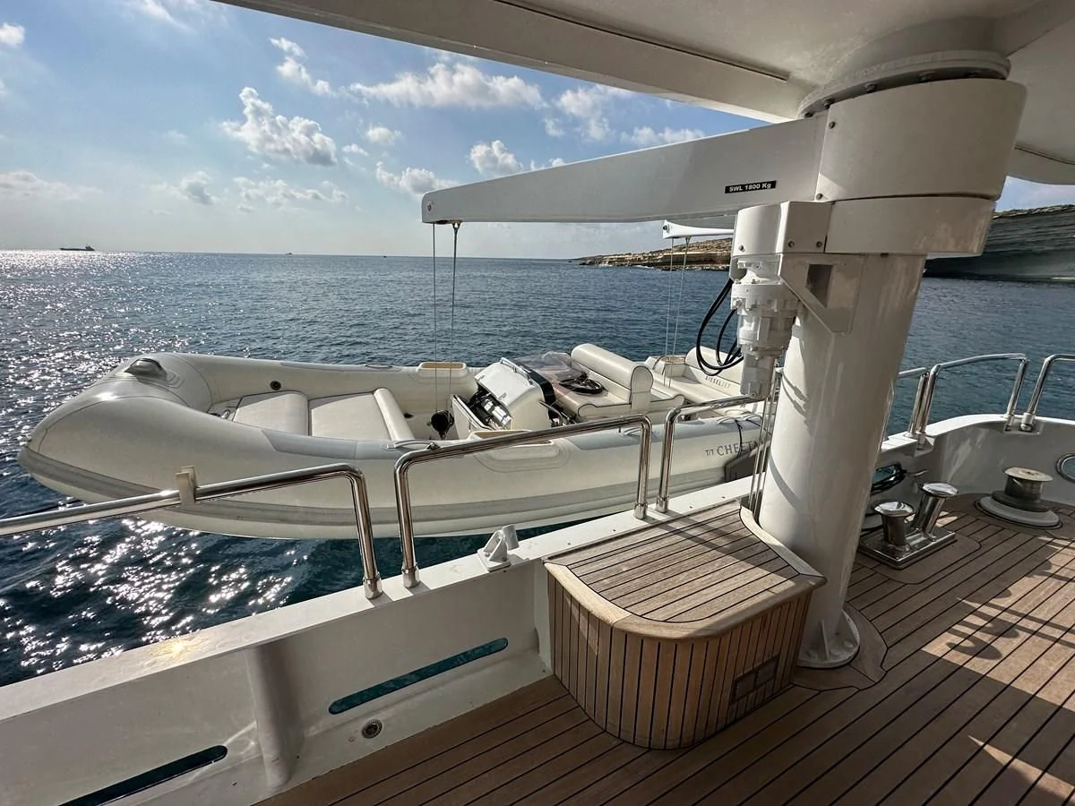 a boat on a deck aboard CHEETAH MOON Yacht for Sale