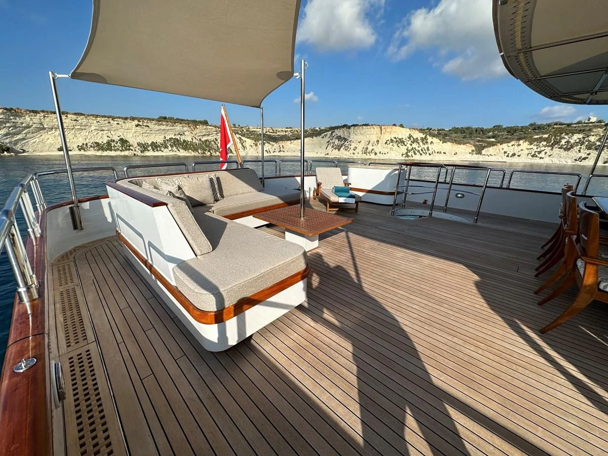 a deck with a view of a city and water aboard CHEETAH MOON Yacht for Sale