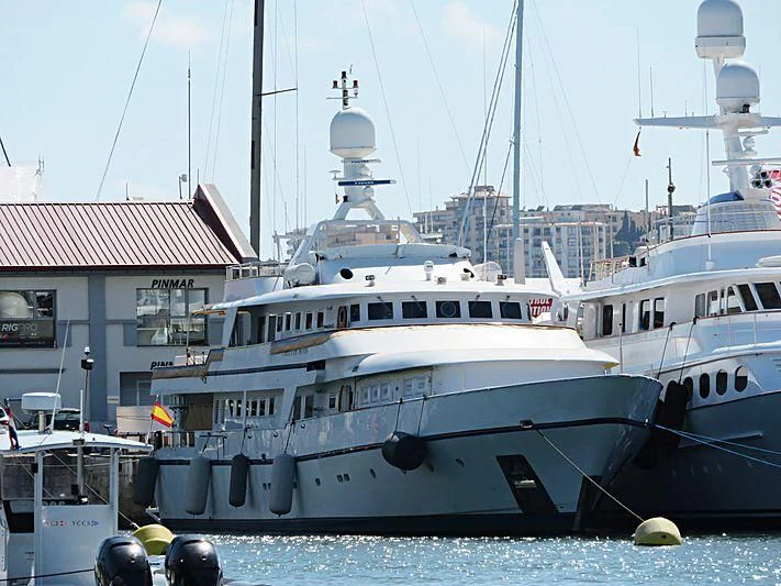 a group of boats are parked in a harbor aboard CHEETAH MOON Yacht for Sale