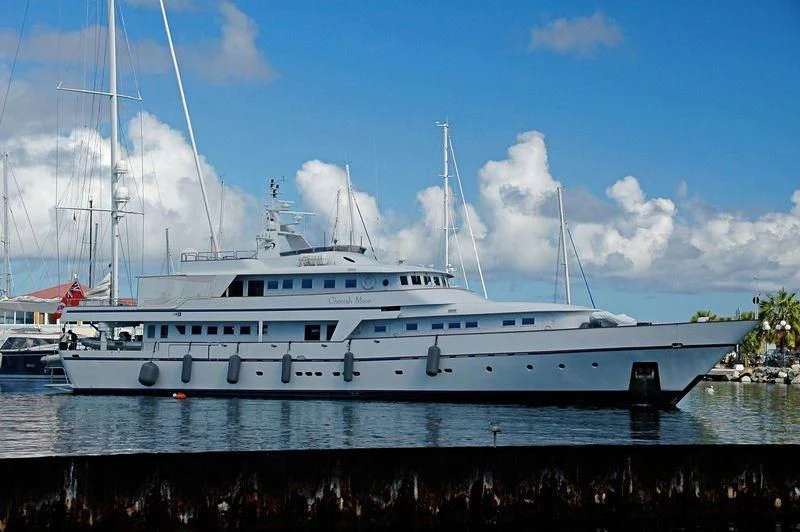 a white yacht in the water aboard CHEETAH MOON Yacht for Sale