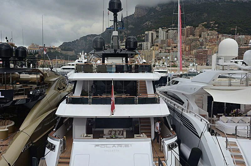 a large boat in a harbor aboard PARILLION Yacht for Sale
