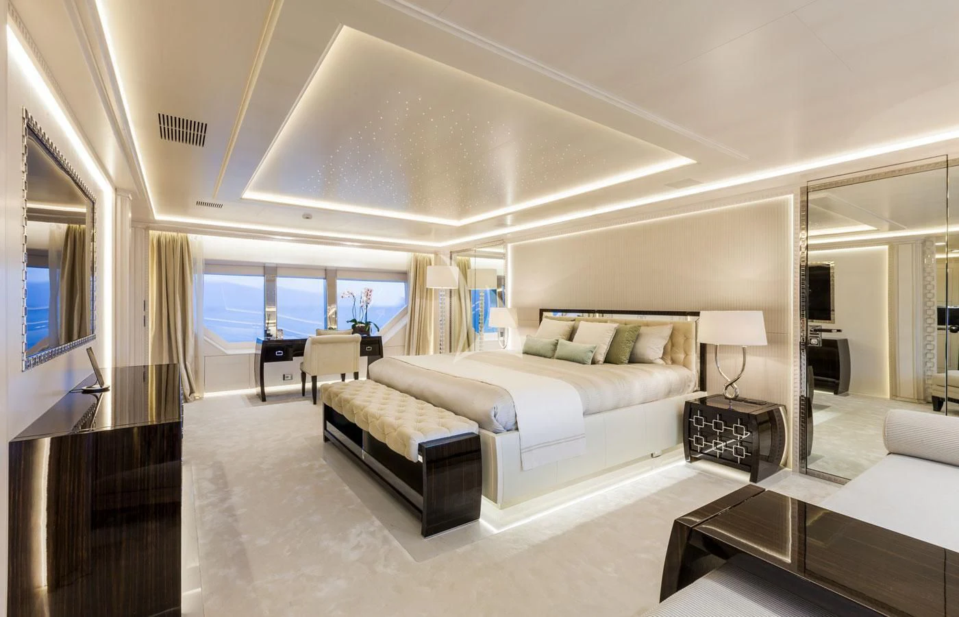 a large living room with a large window aboard PARILLION Yacht for Sale