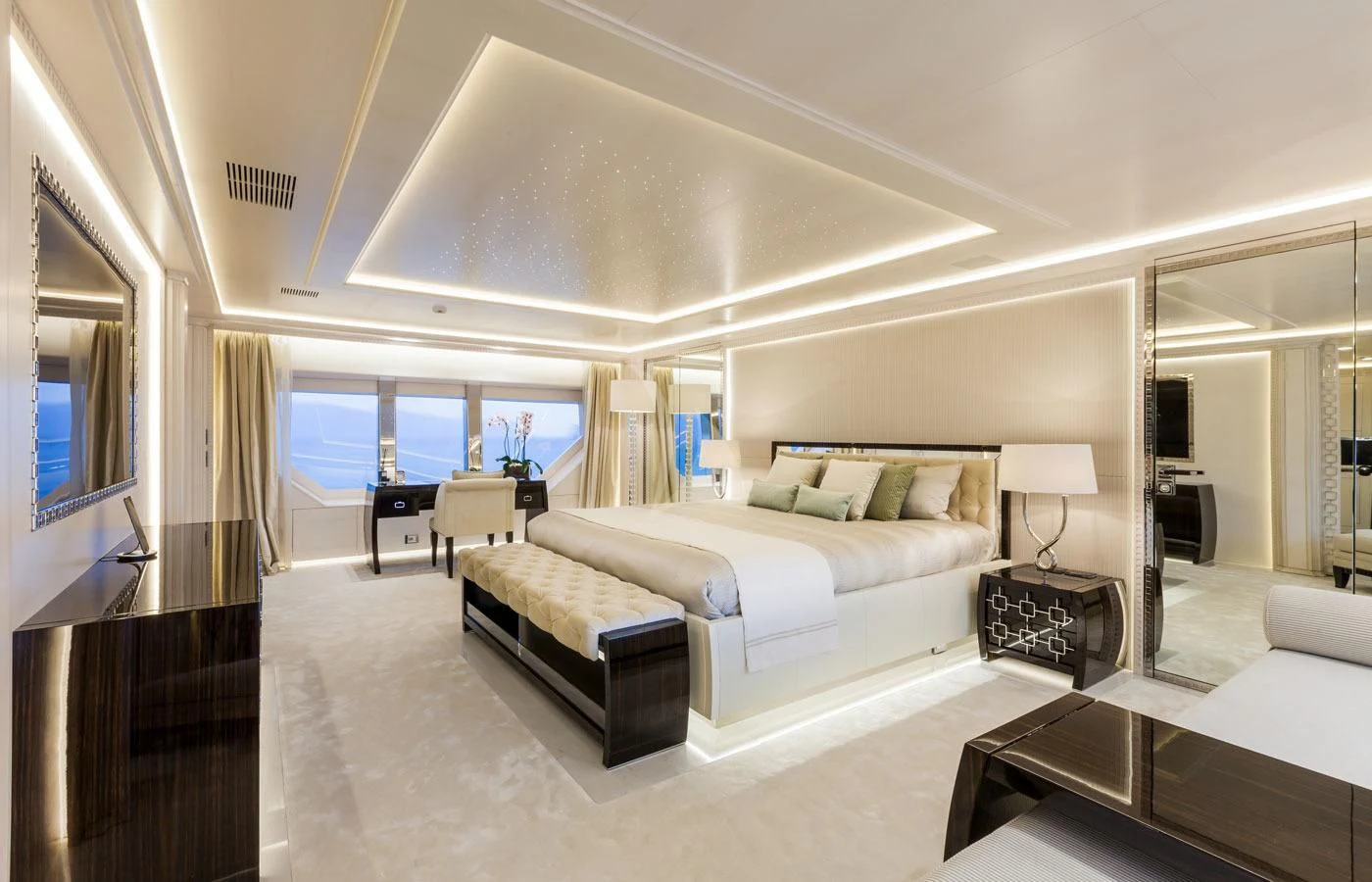 a living room with a large window aboard PARILLION Yacht for Sale