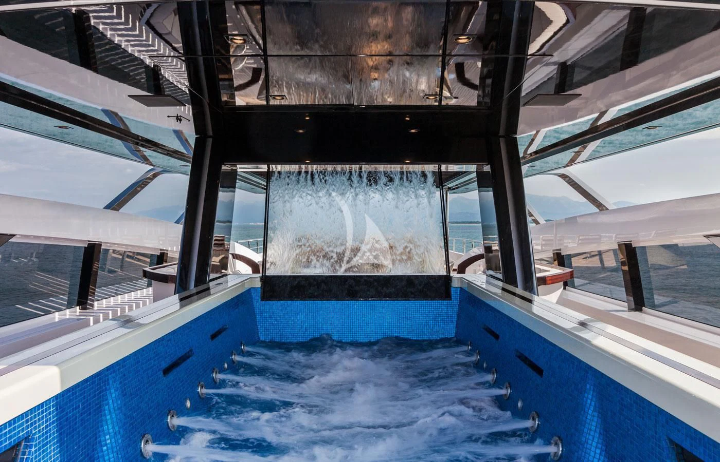 a large room with a large window aboard PARILLION Yacht for Sale