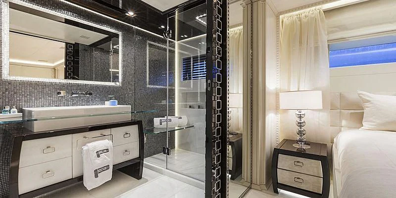 a bathroom with a glass shower aboard PARILLION Yacht for Sale