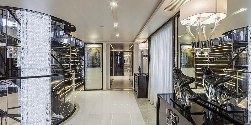 a large room with glass walls aboard PARILLION Yacht for Sale