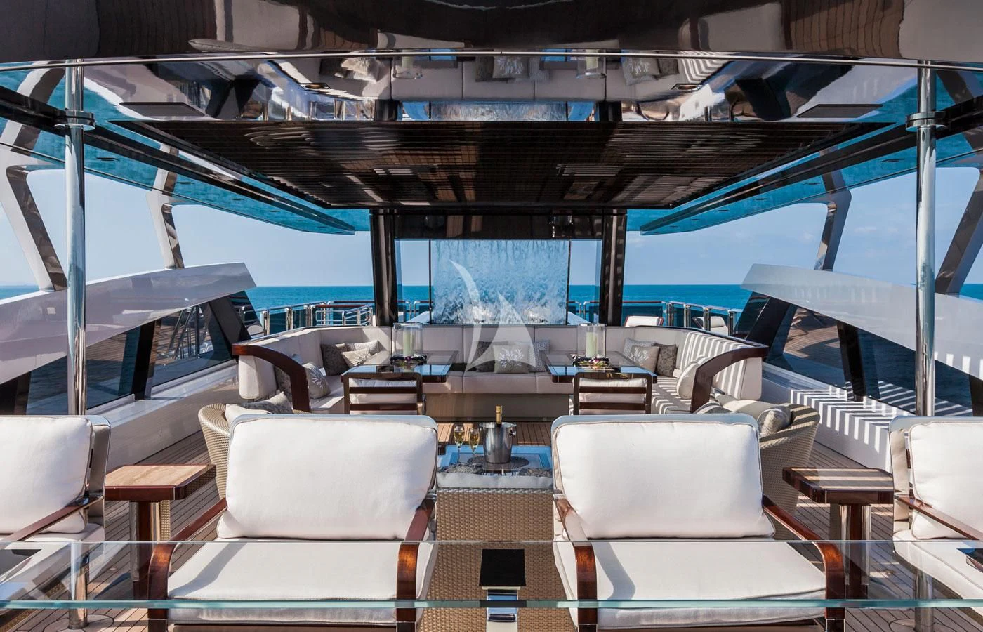 a room with a view of the ocean and the deck aboard PARILLION Yacht for Sale