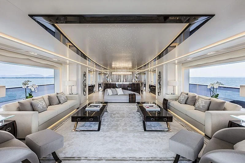 a living room with a large window aboard PARILLION Yacht for Sale