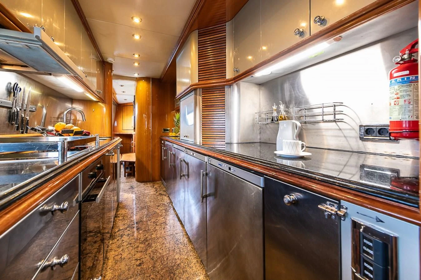 a kitchen with a large island aboard SMOOTH OPERATOR Yacht for Sale