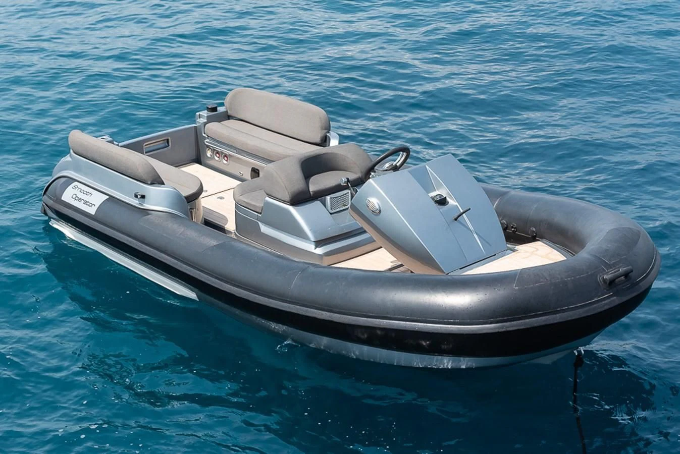 a black and silver boat on water aboard SMOOTH OPERATOR Yacht for Sale