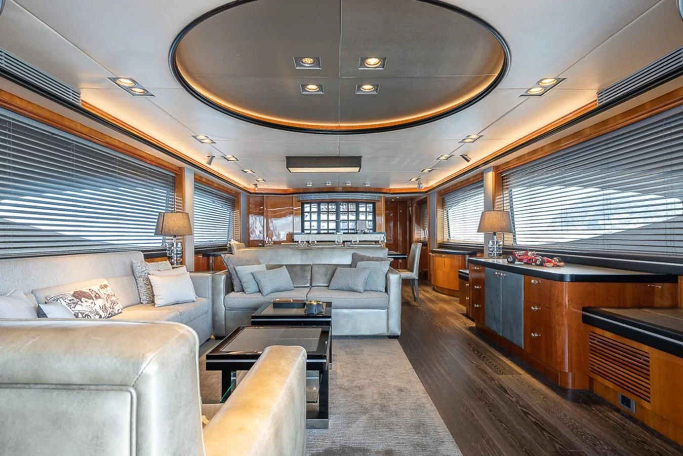 a living room with a large window aboard SMOOTH OPERATOR Yacht for Sale