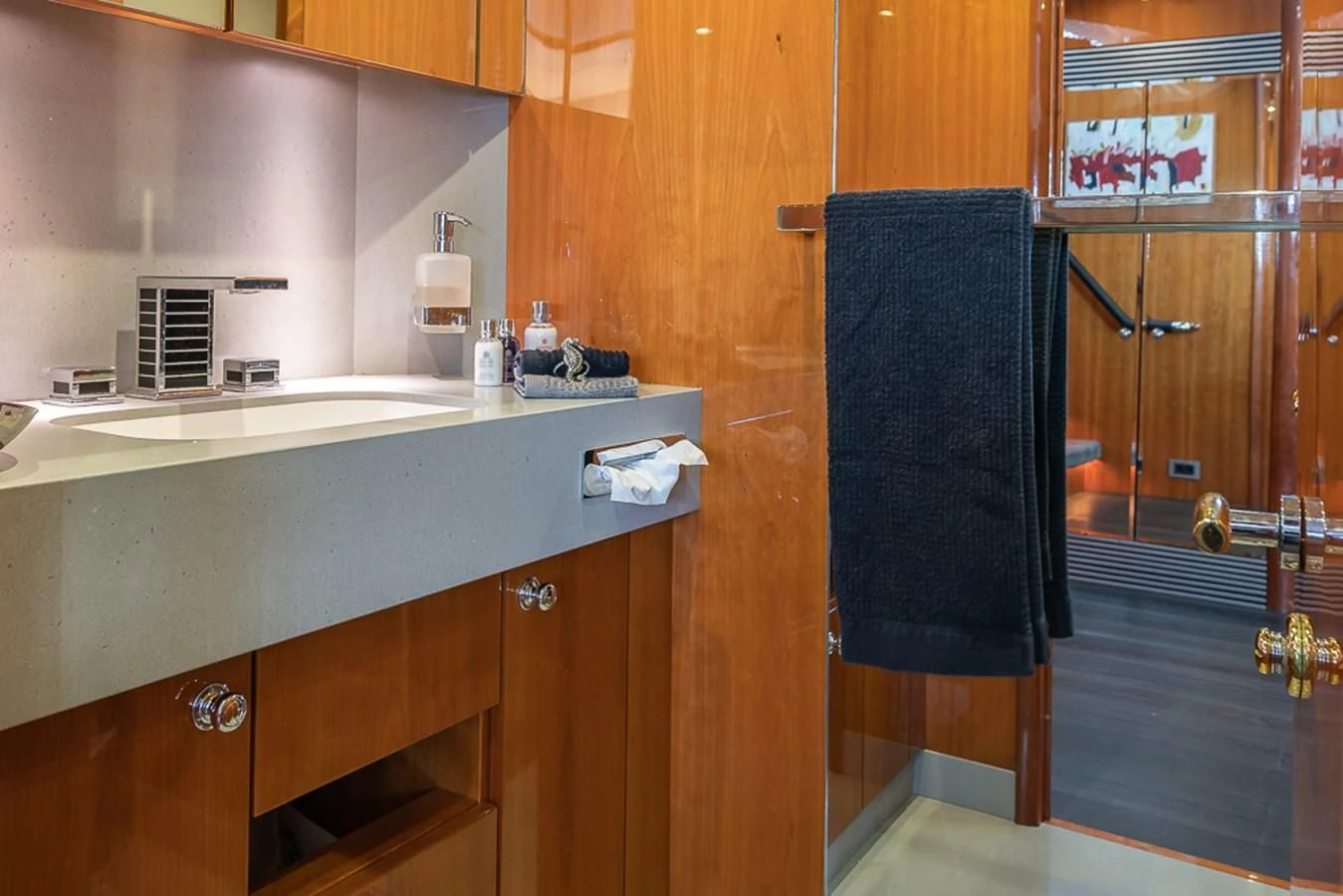 a kitchen with a sink and a microwave aboard SMOOTH OPERATOR Yacht for Sale