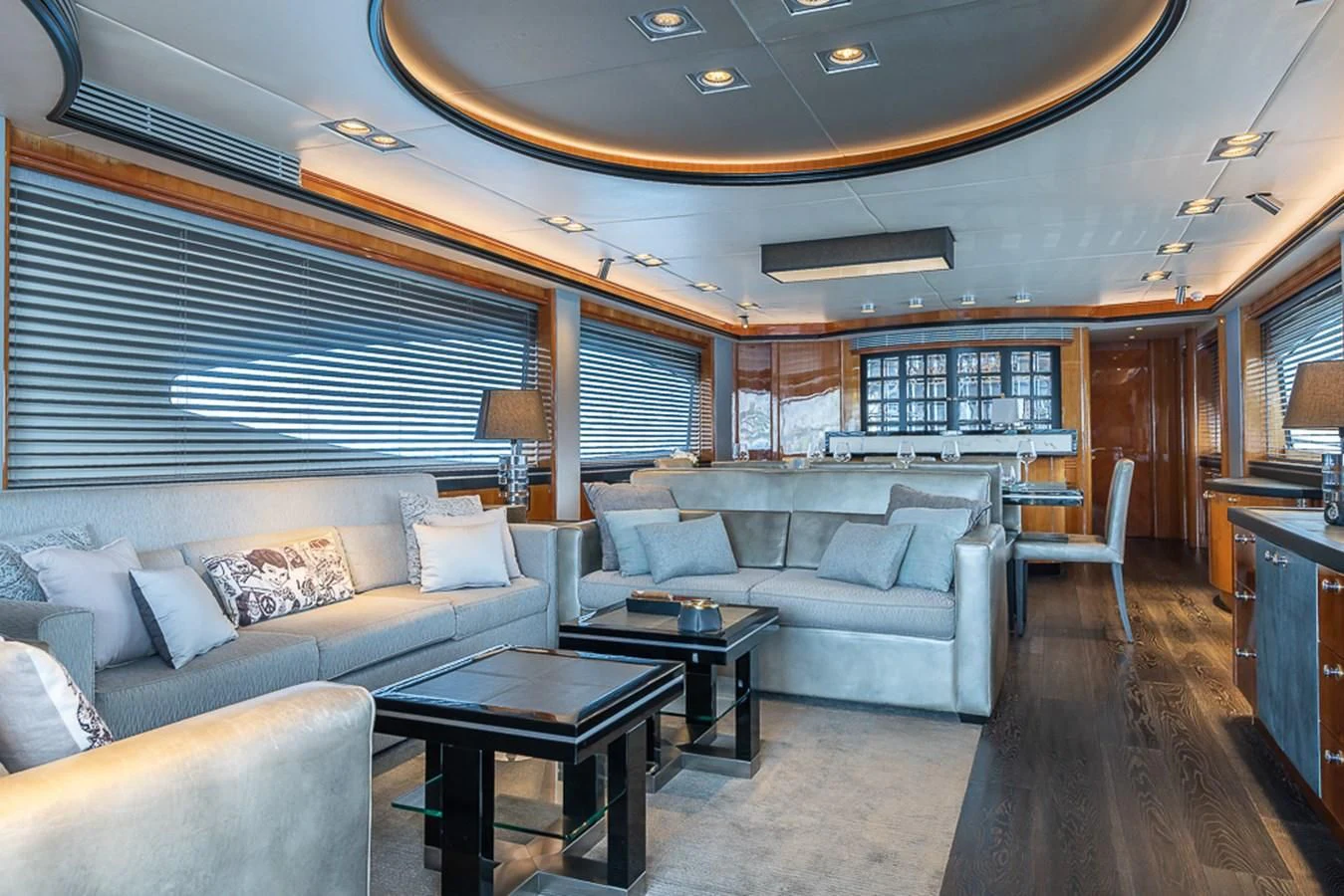 a living room with a couch and a table aboard SMOOTH OPERATOR Yacht for Sale