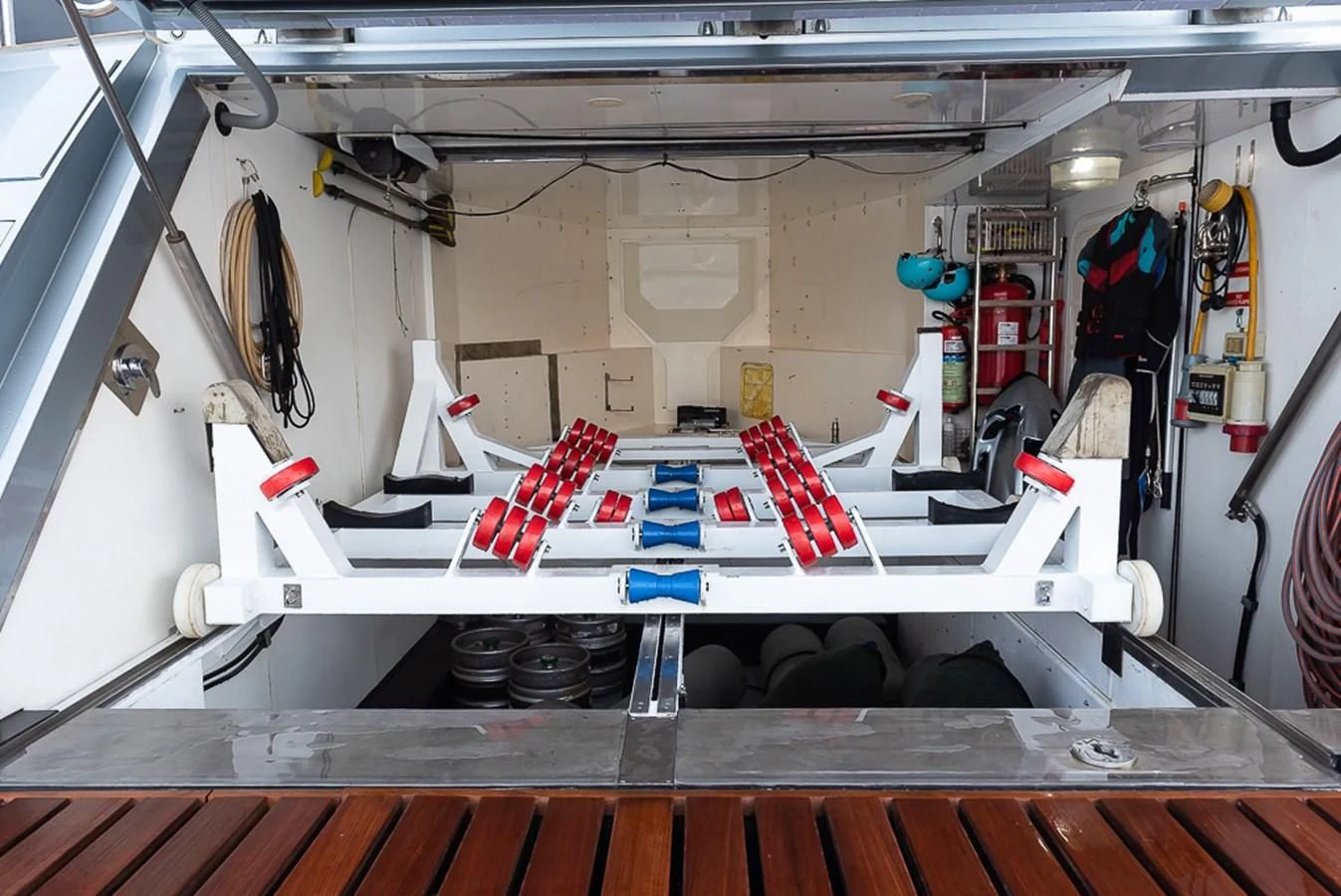 a shelf with clothes and shoes aboard SMOOTH OPERATOR Yacht for Sale
