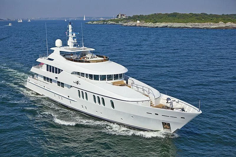a large white boat in the water aboard COCO Yacht for Sale