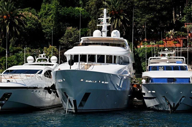 a group of boats in a harbor aboard COCO Yacht for Sale