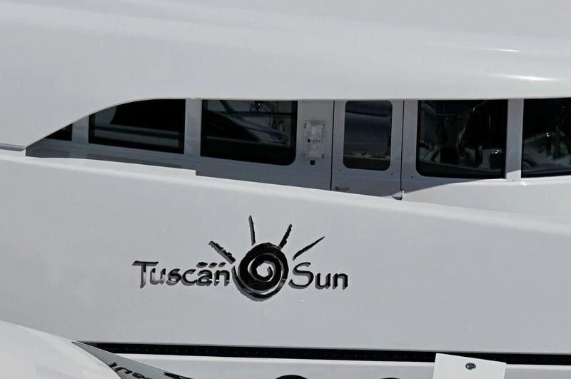 a white car with a drawing on it aboard COCO Yacht for Sale