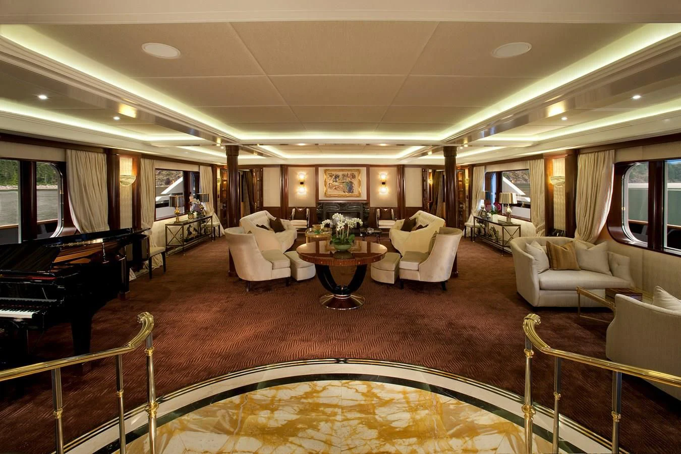 a living room with a large rug aboard ATTESSA IV Yacht for Sale