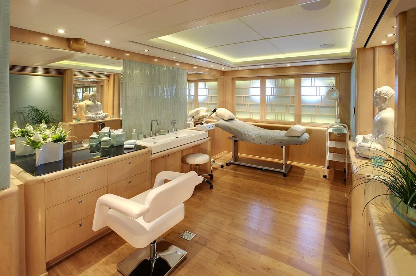 a room with a bed and a bench aboard ATTESSA IV Yacht for Sale