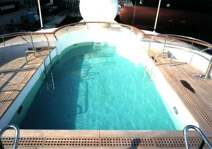 a pool table with a pool aboard ATTESSA IV Yacht for Sale
