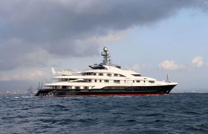 a large white boat in the water aboard ATTESSA IV Yacht for Sale