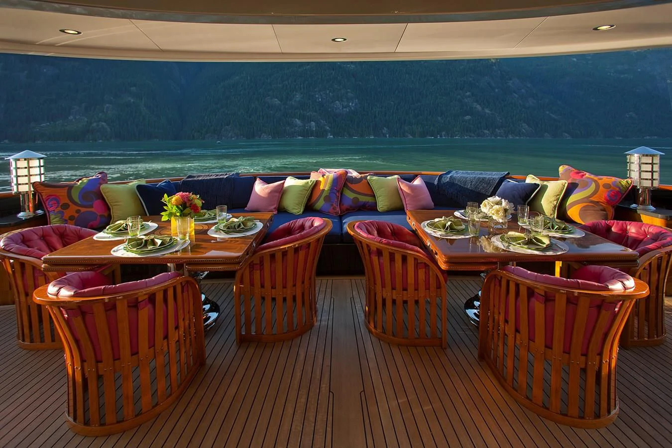 a deck with chairs and tables aboard ATTESSA IV Yacht for Sale