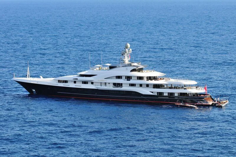 a large white ship in the water aboard ATTESSA IV Yacht for Sale
