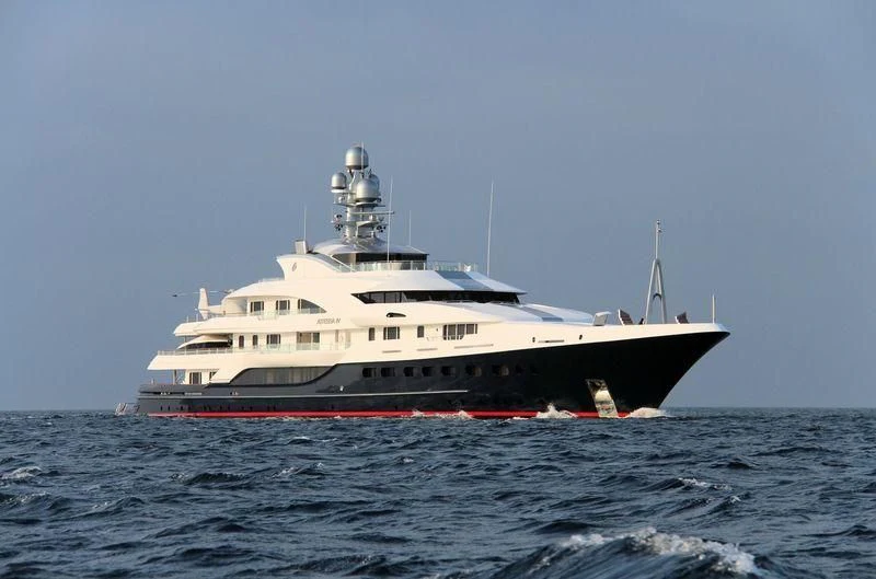a large white boat in the water aboard ATTESSA IV Yacht for Sale