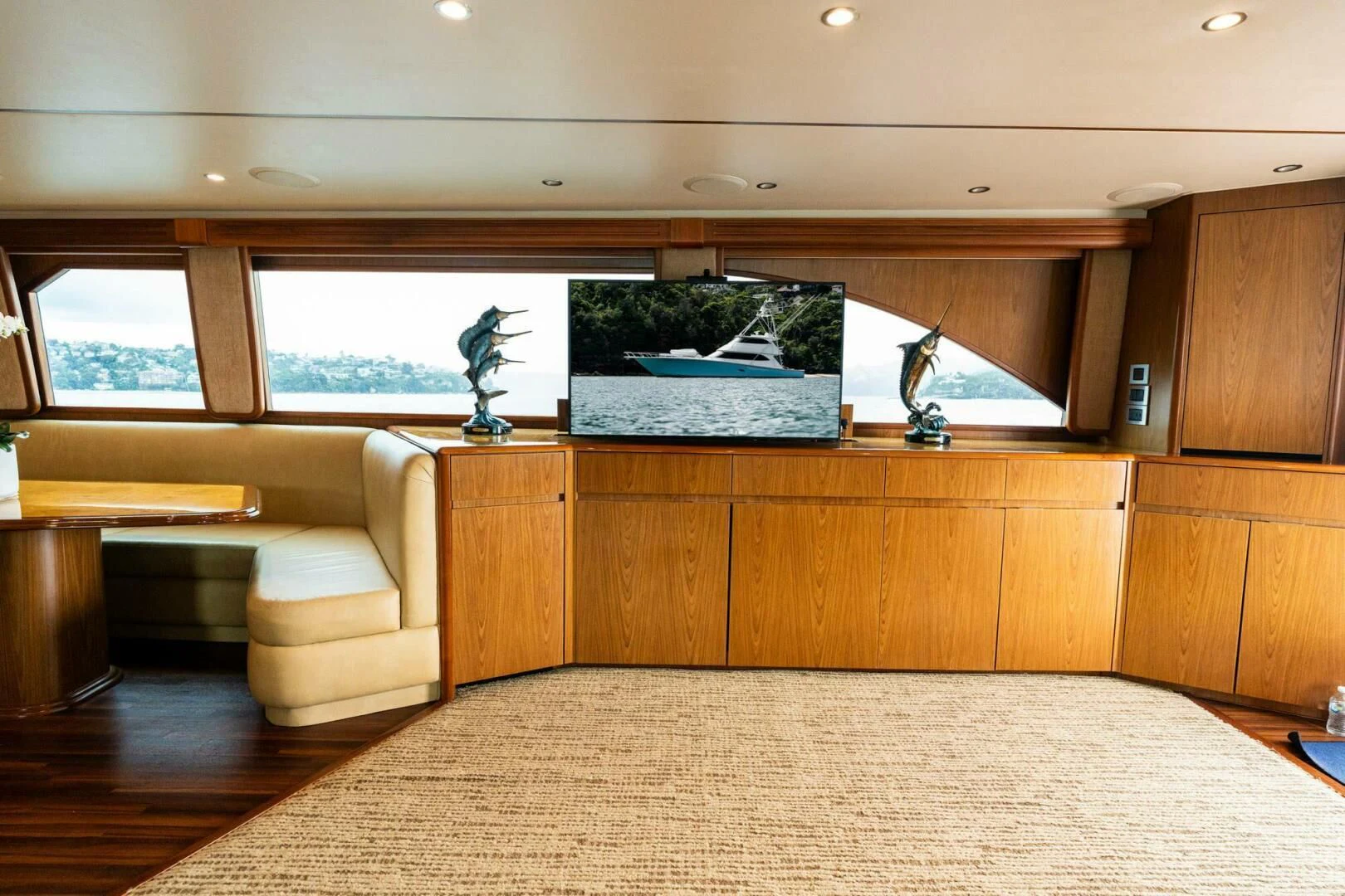 a room with a large mirror and a couch aboard LITTLE AUDREY Yacht for Sale