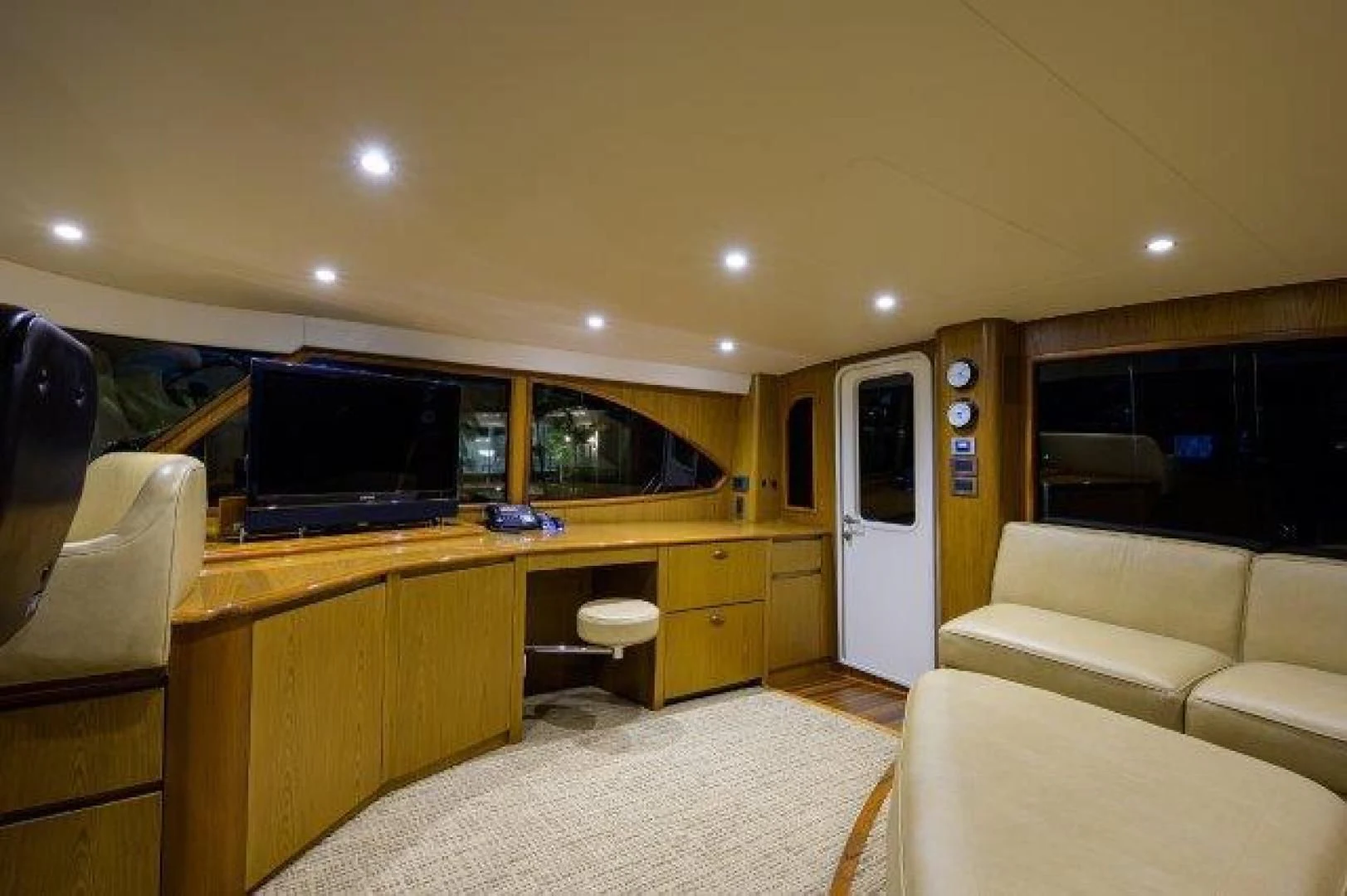 a bedroom with a bed and a desk aboard LITTLE AUDREY Yacht for Sale