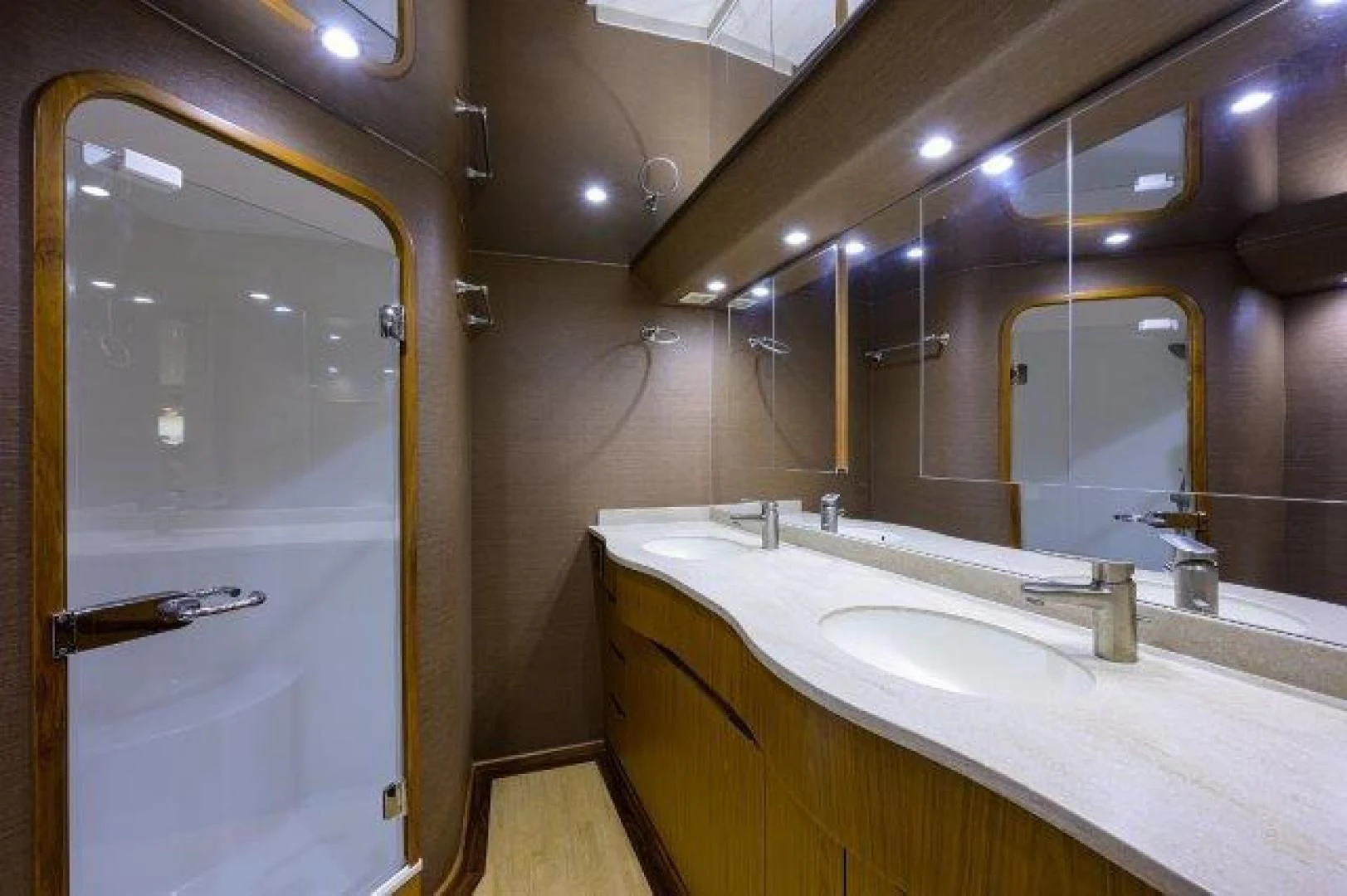 a bathroom with a large mirror aboard LITTLE AUDREY Yacht for Sale