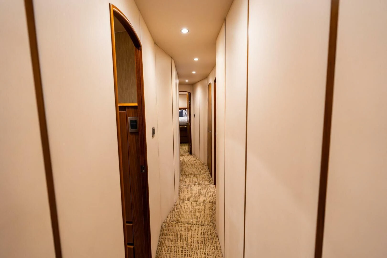 a hallway with doors aboard LITTLE AUDREY Yacht for Sale