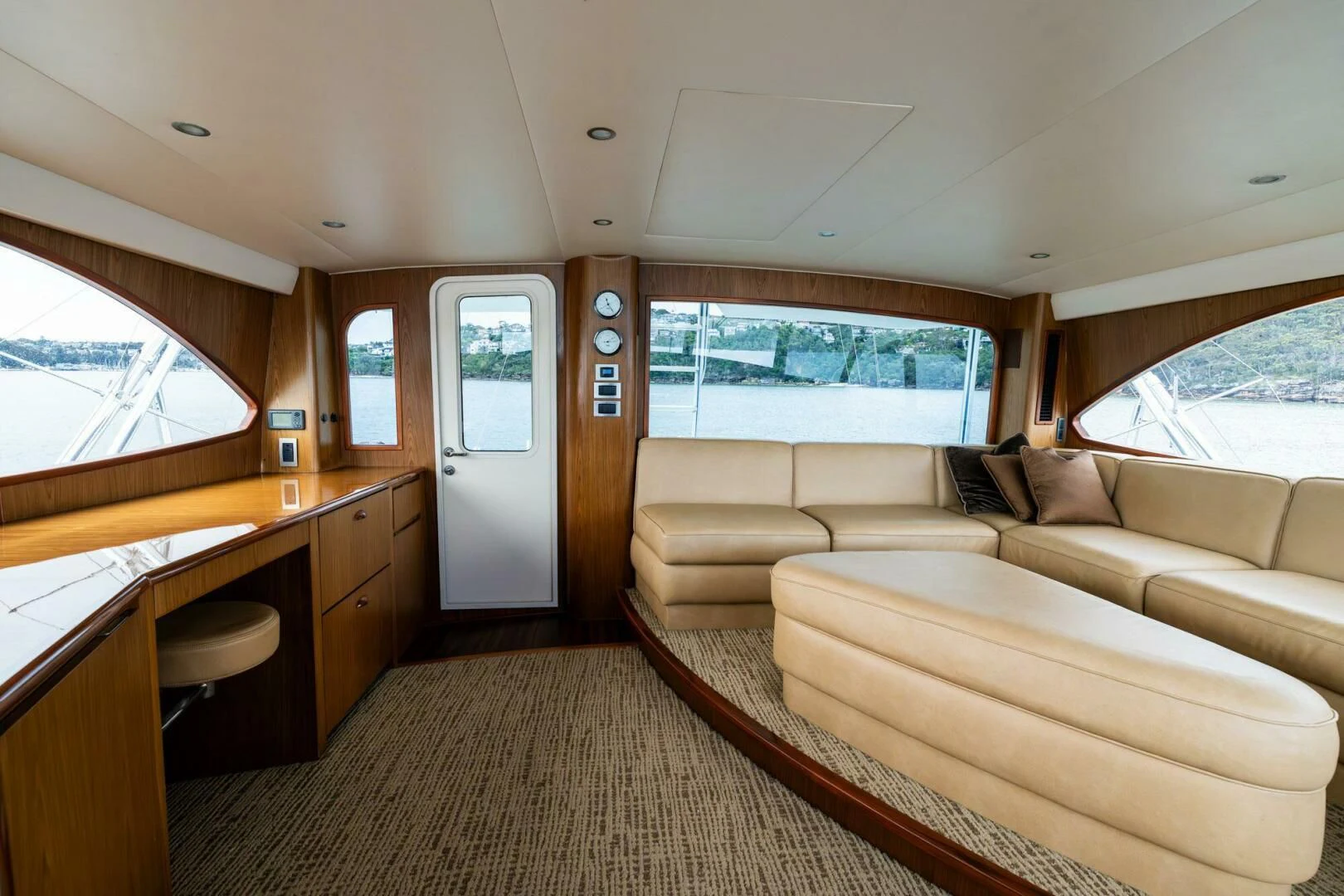 a living room with a couch and a table aboard LITTLE AUDREY Yacht for Sale