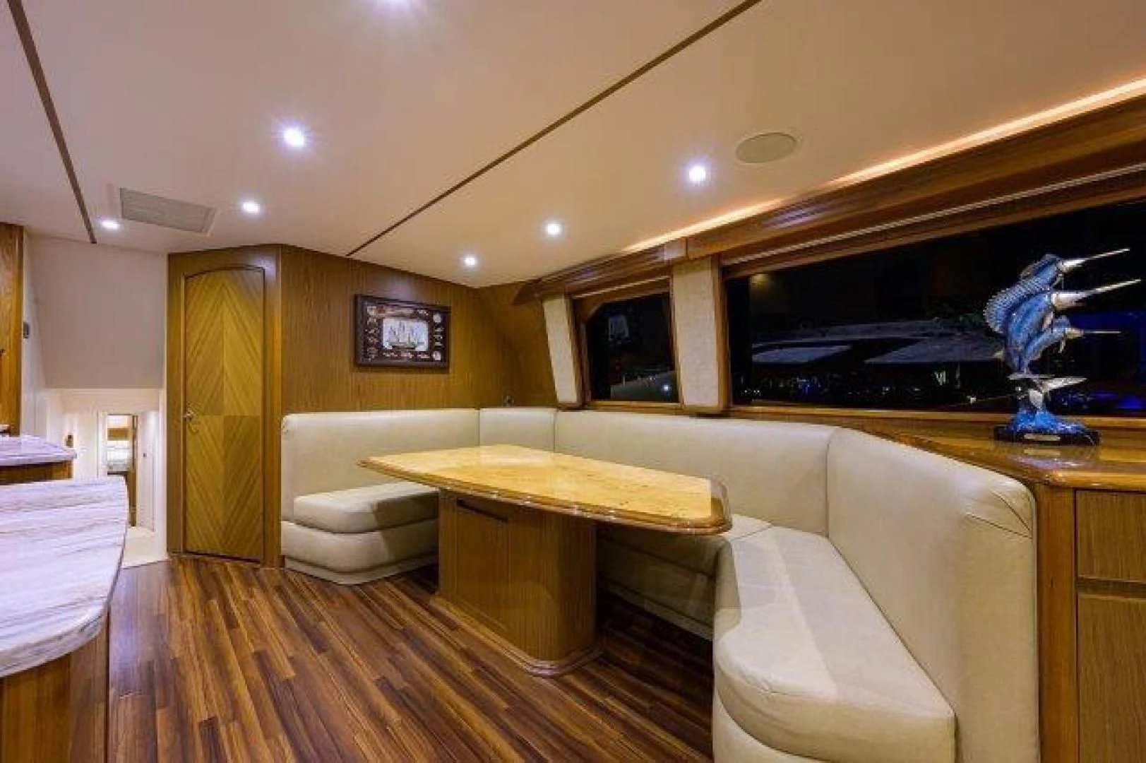 a room with a table and chairs aboard LITTLE AUDREY Yacht for Sale