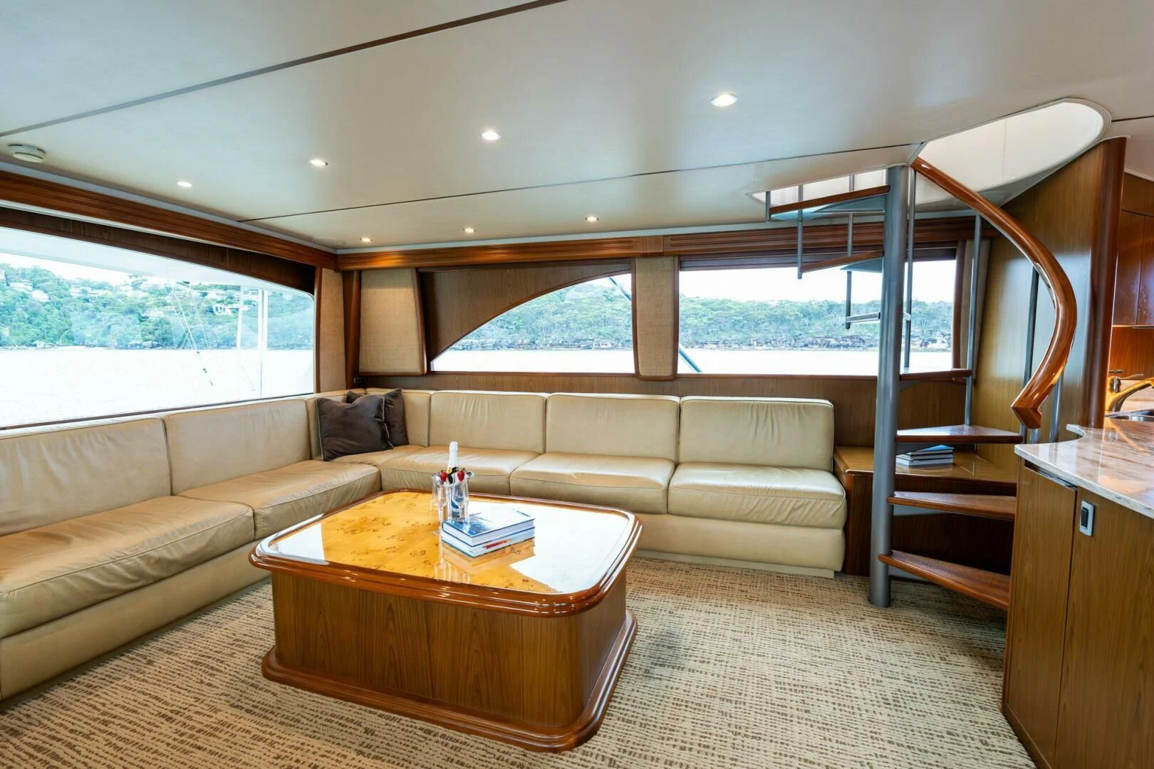 a living room with a couch and a table aboard LITTLE AUDREY Yacht for Sale