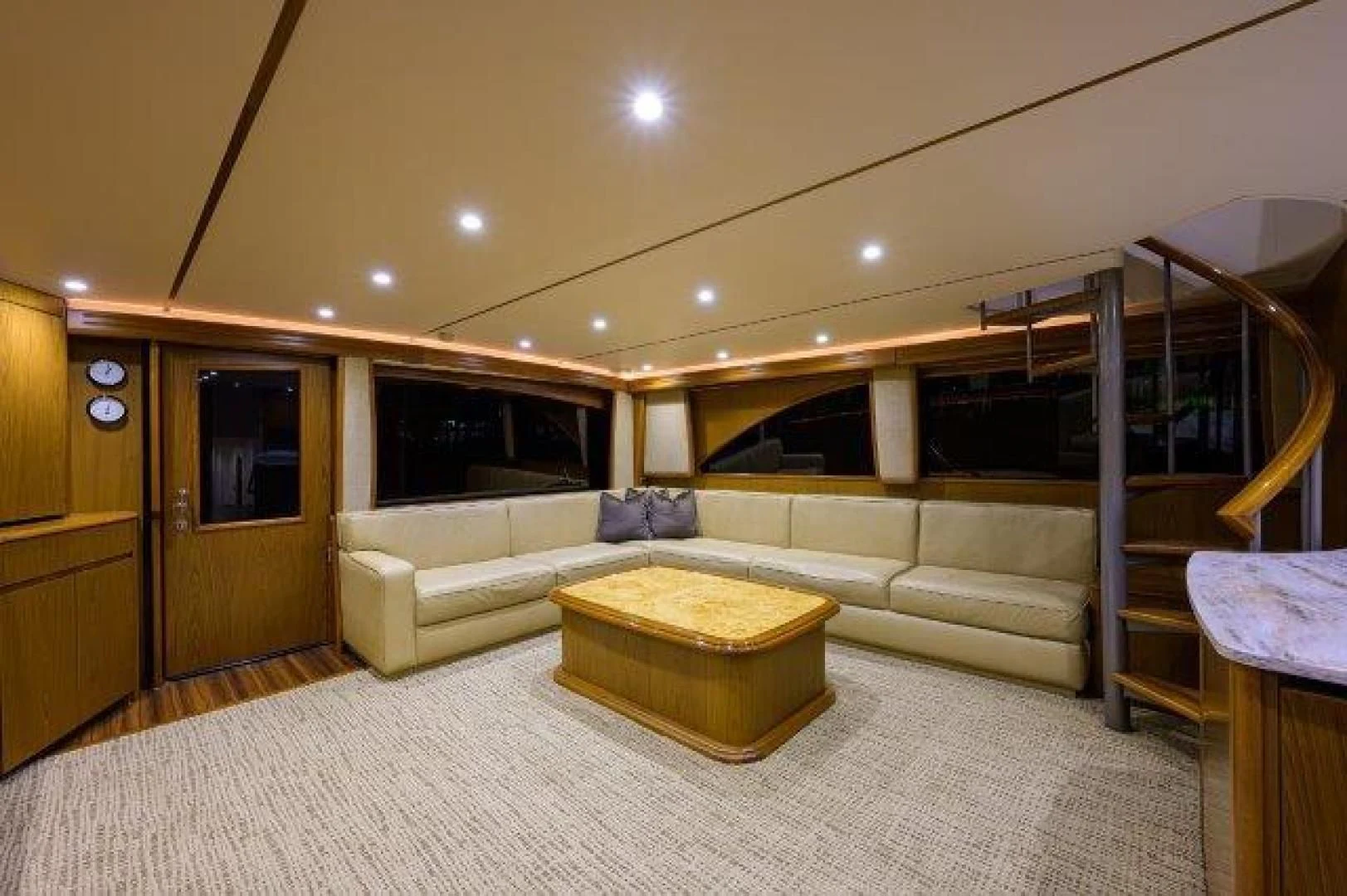 a living room with a couch and a table aboard LITTLE AUDREY Yacht for Sale